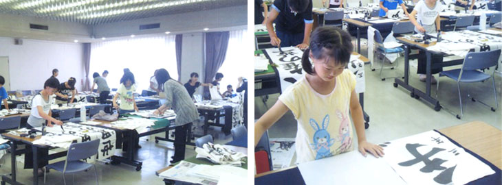 夏休みの課題制作に挑む小中学生